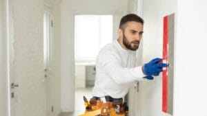 Worker with a trowel on the wall